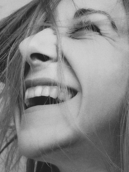 Close up image of a women laughing